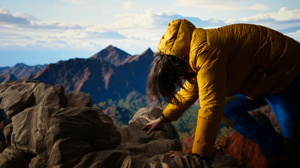 Hiker tripping and losing balance on the rocky mountain peak cause of  Altitude Sickness

